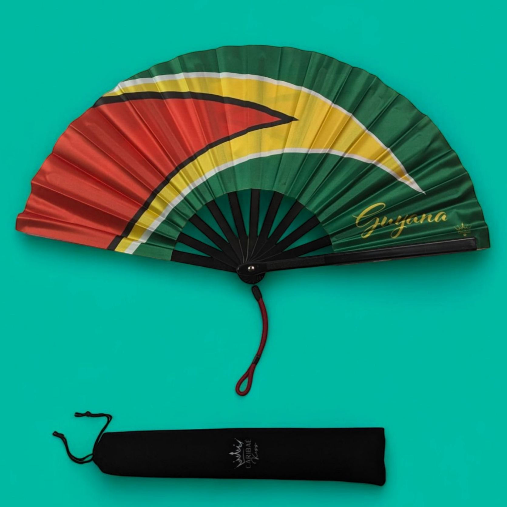 Guyana folding hand fan featuring Guyanese flag and tassel – cultural accessory by Caribae Kiss for Georgetown, Berbice, Linden, and Caribbean festivals