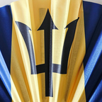 Close up of Barbados flag inspired bamboo folding hand fan.  Close up of the national emblem of the Trident