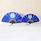 Belize flag inspired bamboo folding hand fans of various sizes (large and small) open and standing.