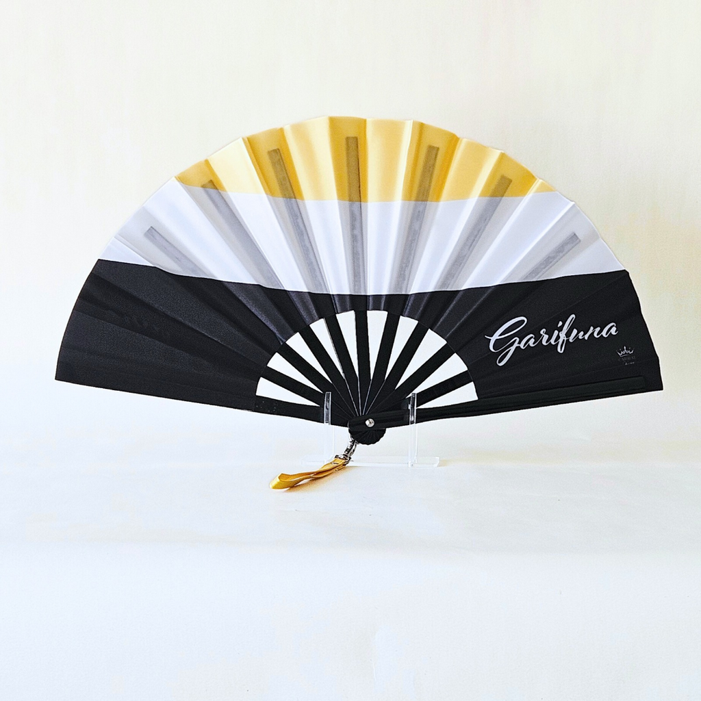 Garifuna flag inspired bamboo folding hand fan, open, standing