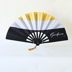 Garifuna flag inspired bamboo folding hand fan, open, standing
