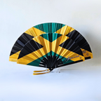 Jamaica flag inspired bamboo folding hand fans of various sizes (large and small) open and standing.