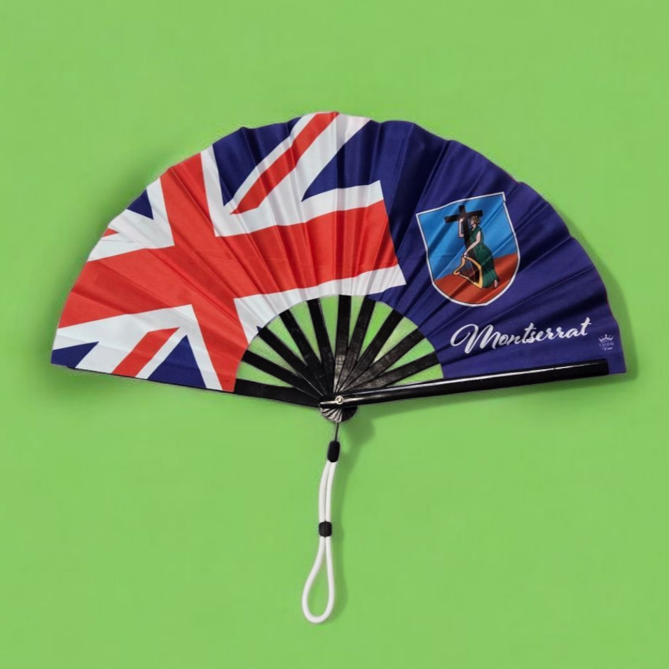 Montserrat folding hand fan featuring the Montserrat flag and tassel – cultural accessory by Caribae Kiss for St. Patrick’s Festival and island pride
